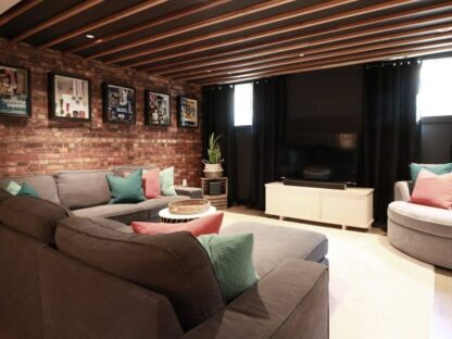 Old Brick Wall Mural, as seen in this basement, is a faux brick wallpaper created from a high quality photo capturing all the realistic texture from About Murals.
