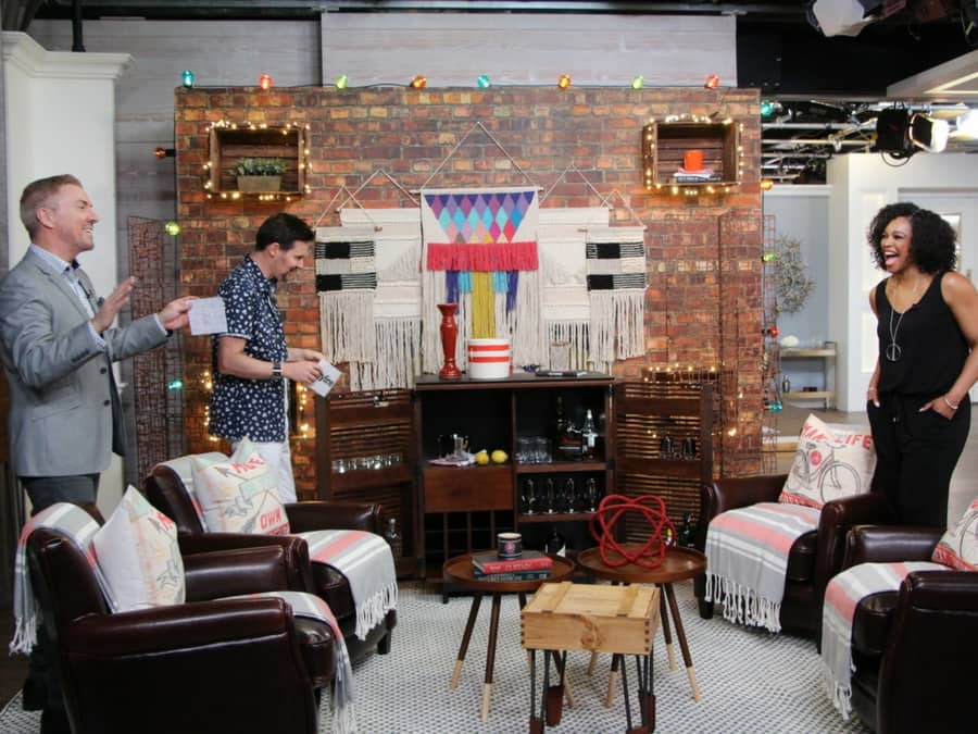 Old Brick Wall Mural on the set of Cityline with Colin and Justin. Brick wallpaper sold by AboutMurals.ca.