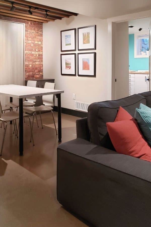 Old Brick Wall Mural, as seen in this home office, is a brick effect wallpaper created from a high res photo that captures the realistic looking texture from About Murals.