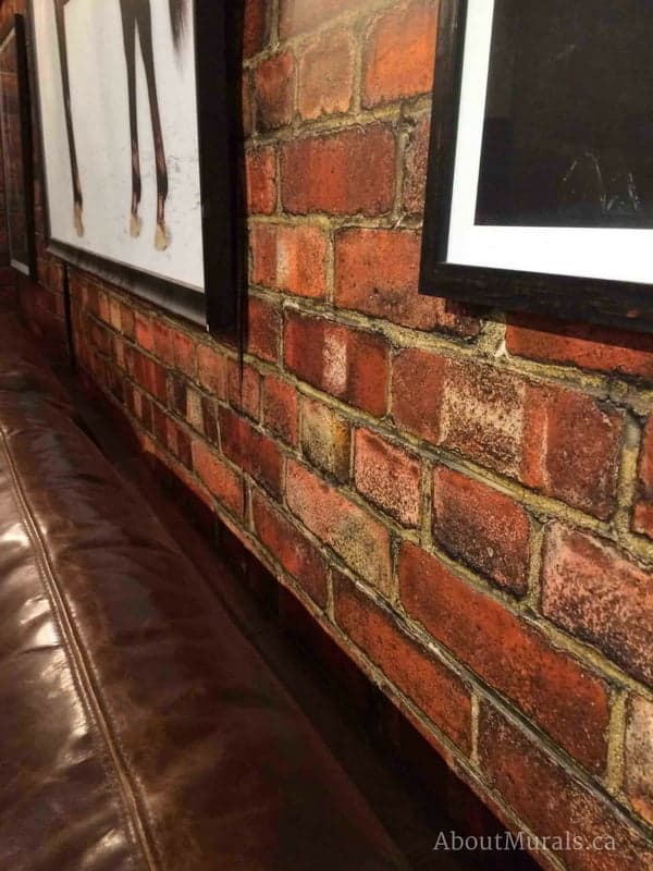 Old Brick Wall Mural, as seen in this living room, is a brick wallpaper sold by AboutMurals.ca.