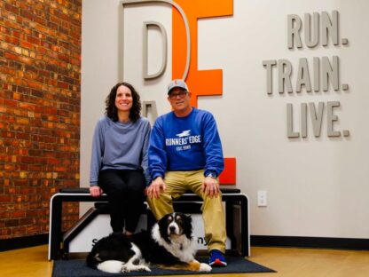 Old Brick Wall Mural, as seen on the wall at a retail store called "Runners Edge", is a high resolution photo wallpaper of realistic brick from About Murals.