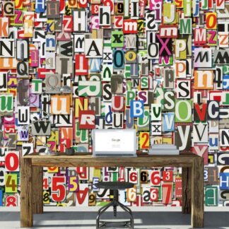 ABC Wallpaper, as seen on the wall of this kids room, features a collage of letters and numbers from About Murals.