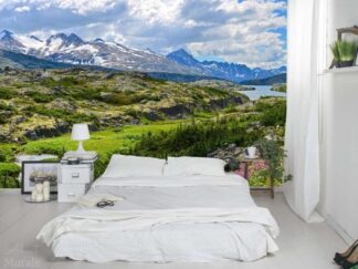 Alaskan Mountains Wallpaper, as seen on this bedroom wall, features towering mountains overlooking a rugged landscape of pine trees and forests. Mountain wallpaper sold by AboutMurals.ca.