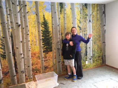 Aspen Forest Elk Mountains Colorado wall mural with AboutMurals.ca customers Sandra and her son