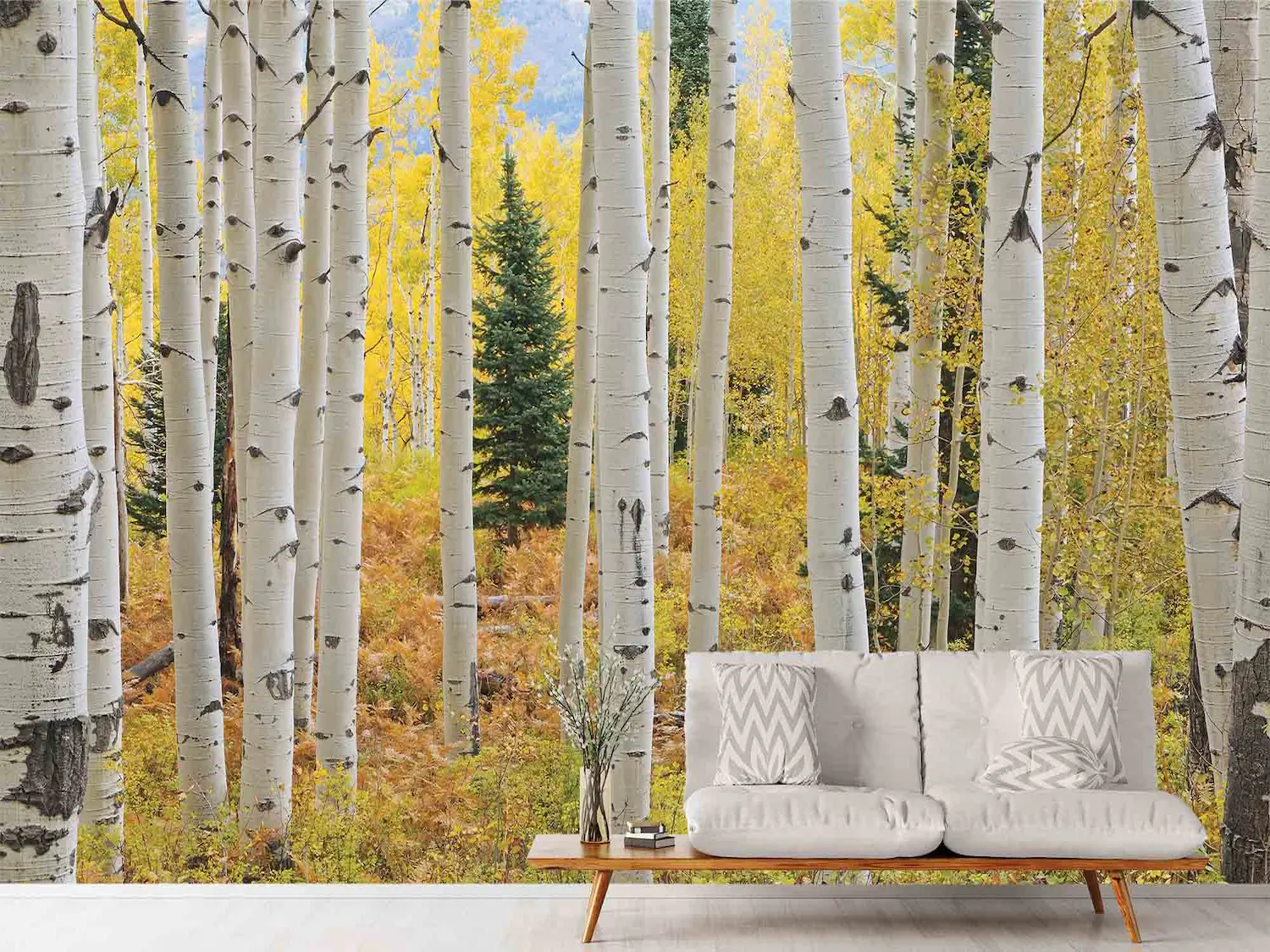 Aspen Forest Wallpaper, as seen on the wall of this reception area in an office, is a photo wall mural of tall trees in a yellow autumn forest in Colorado from About Murals.
