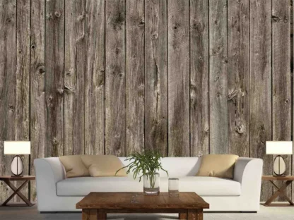 Barn Wood Wallpaper, as seen on the wall of this brown rustic farmhouse living room, is a photo mural of realistic wood planks in brown from About Murals.