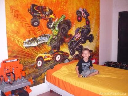 Monster Truck Wallpaper, as seen in this boy room, features trucks crushing cars. Kids wallpaper sold by About Murals.