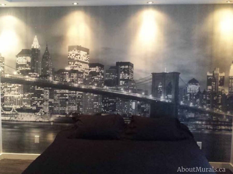 NYC Bridge Wallpaper, as seen in this bedroom, features the iconic New York City bridge. Cityscape wallpaper from AboutMurals.ca.k and White wall mural, as seen in this black bedroom, features the New York City skyline. Removable wallpaper sold by AboutMurals.ca