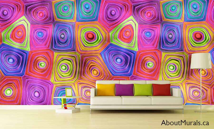 Hypnosis Wall Mural, as seen in this colourful living room, is a rainbow coloured wallpaper with an almost floral feeling from About Murals.