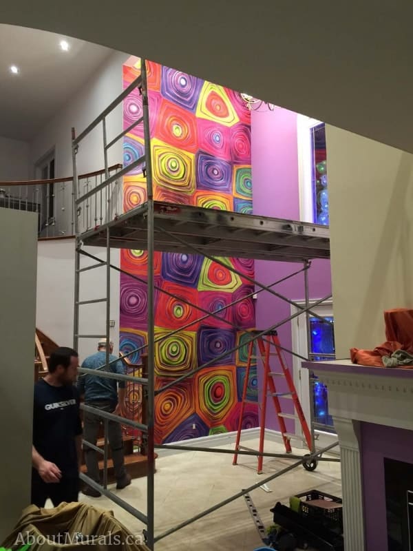 Hypnosis Wall Mural, as seen in this foyer, is a psychedelic wallpaper from About Murals.