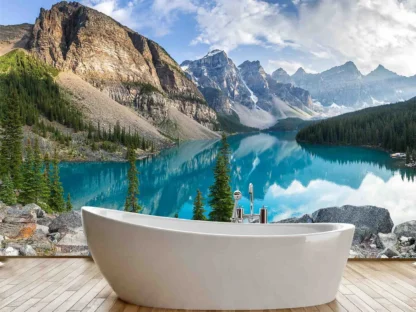 Moraine Lake Wallpaper, as seen on the wall of this bathroom, is a photo mural with mountains reflected in a turquoise blue lake in Canada from About Murals.