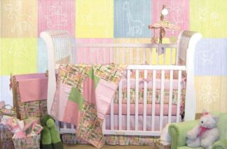 Pastel Animal Wallpaper, as seen on the wall of this nursery, features silhouettes of white animals against a soft pink, blue, yellow, orange or green background from About Murals.