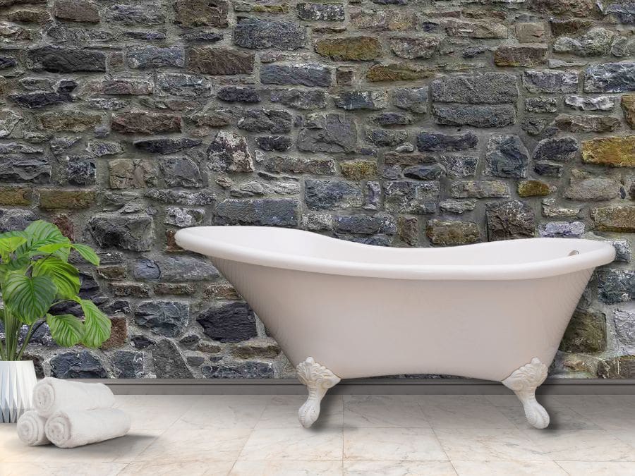 Stone Wall Mural, as seen on the wall of this bathroom, is a texture wallpaper created from a high resolution photo of a grey, blue and green stone wall that looks realistic from About Murals.
