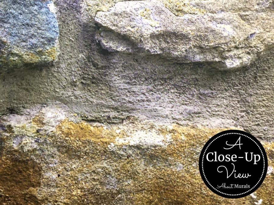 A close up zoom view of a stone wall mural from About Murals
