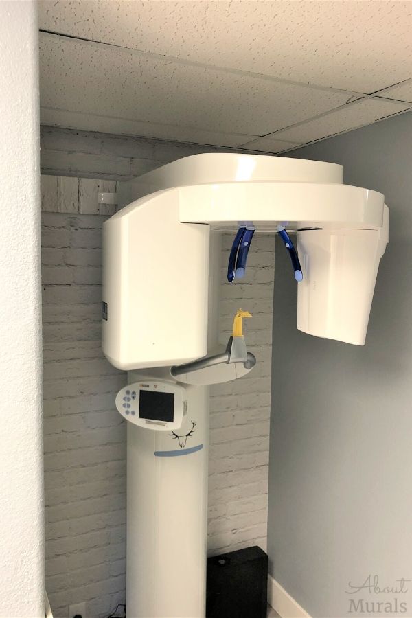 White Brick Wallpaper, as seen in this dental office, creates a light, textured look on walls with its whitewashed painted bricks. Brick wallpaper sold by AboutMurals.ca.