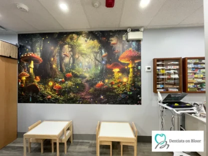 A custom dentist wallpaper, as seen on the wall of Dentists on Bloor, featuring dental tools hiding in an enchanted forest above the kids waiting area. Printed and installed by About Murals.