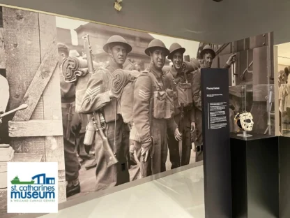 Custom Wallpaper, as seen on the wall of the St. Catharines Museum, created from archived photographs on old negatives of soldiers in World War 2 by About Murals.