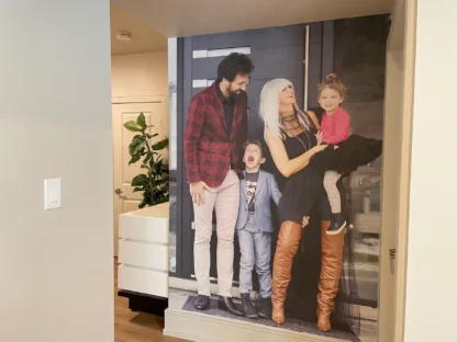 Custom Wallpaper from photo of a mom, dad and two kids from About Murals.