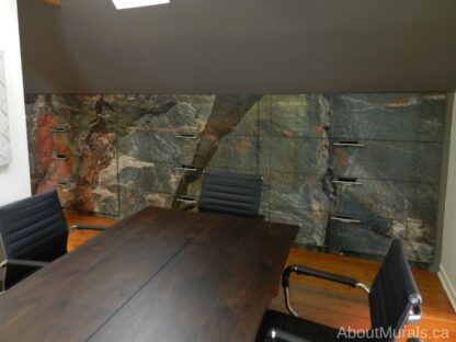 Rock Face Wallpaper, as seen on the wall of this office, features rugged grey and orange stone. Stone wallpaper sold by AboutMurals.ca.