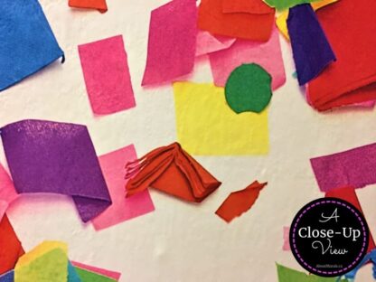 A close-up photo of a colourful confetti wallpaper sold by AboutMurals.ca