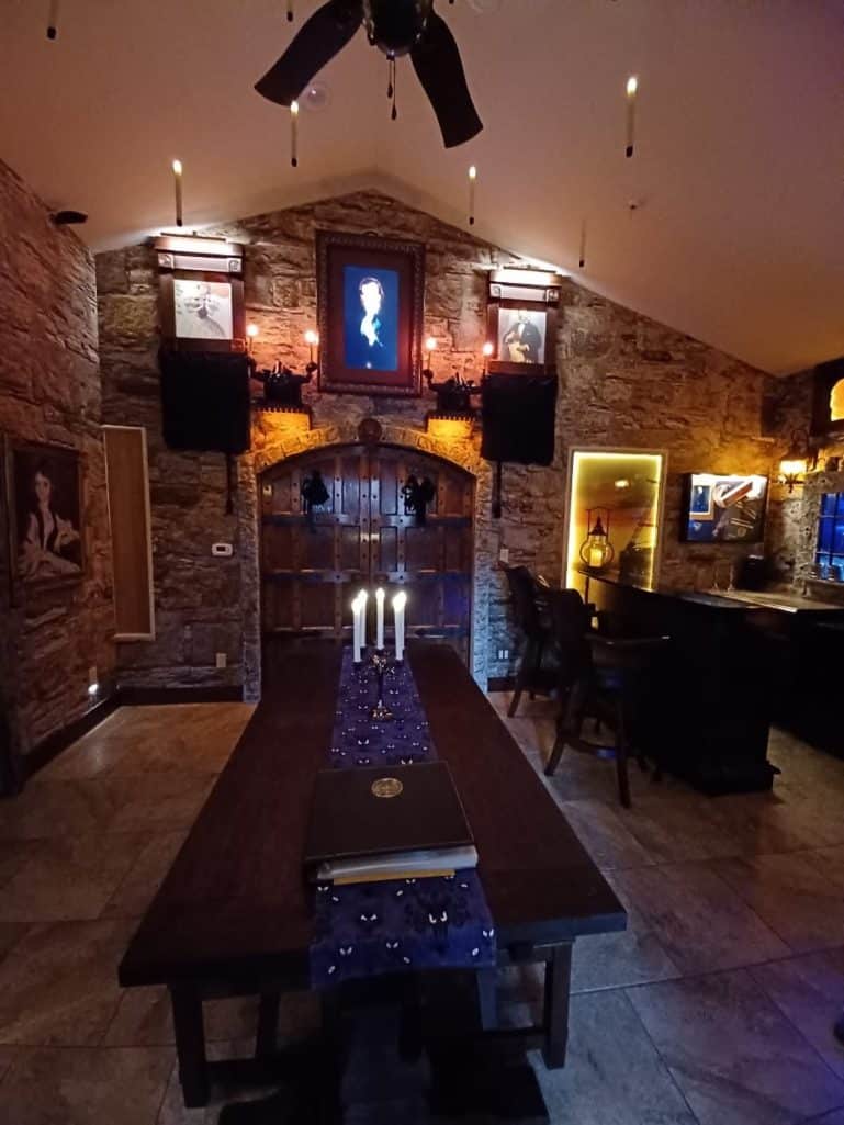 Castle Stone Wallpaper, as seen on the wall of this Harry Potter Themed Dining Room, is a photo wall mural of a brown realistic stone wall full of texture from About Murals.