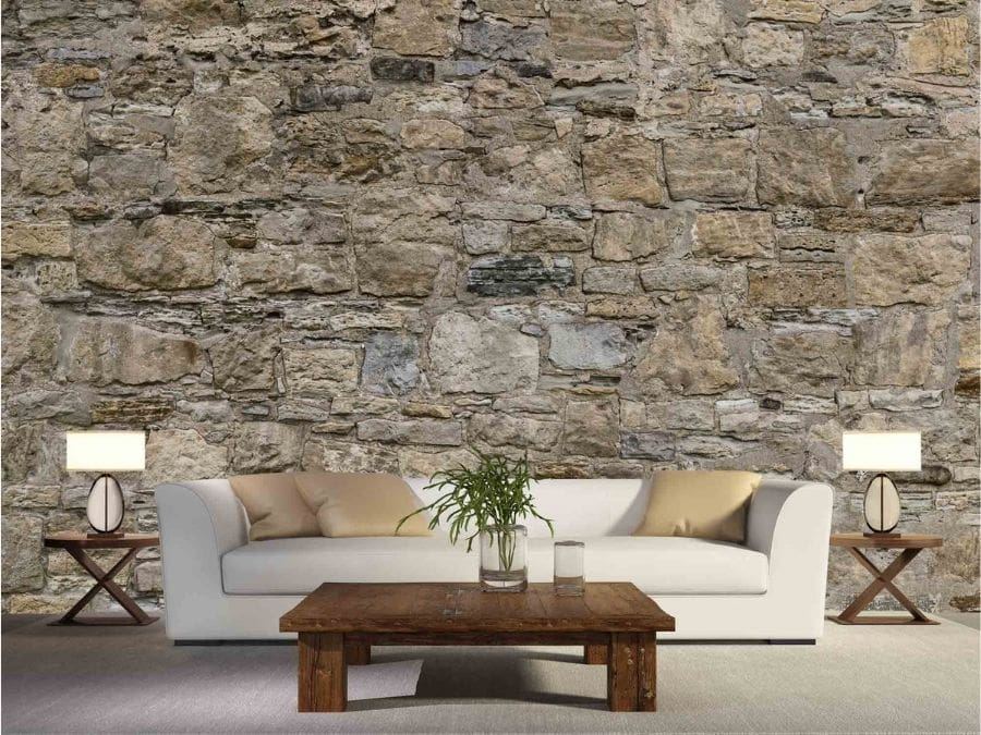 Castle Stone Wallpaper, as seen on the wall of this rustic living room, is a photo mural of textured faux stones from About Murals.