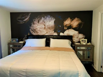 Black Floral Wallpaper, as seen on the wall of this master bedroom, is a mural wallpaper with oversized flowers on a black background from About Murals.