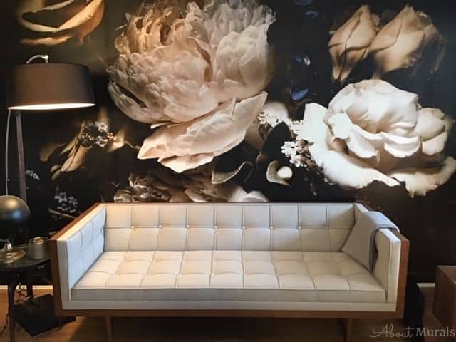 Black Floral Wallpaper, as seen on this living room wall, feels beautiful with peony and rose flowers on a dark background. Flower wallpaper sold by AboutMurals.ca.