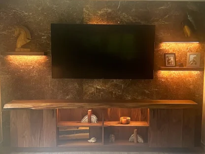 Dark Brown Marble Wallpaper, as seen on the wall of this TV Room, is a wall mural of elegant, realistic marble slabs from About Murals