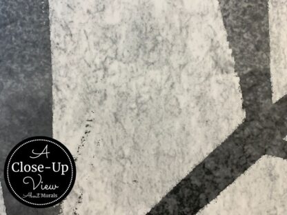 A close-up view of grey palm leaves on a concrete background from About Murals.