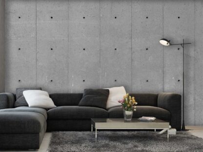 Concrete Wallpaper, as seen on the wall of this grey living room, adds tons of texture with its tie holes and slabs from About Murals.