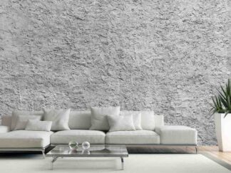 Stucco Wallpaper, as seen on the wall of this living room, is a photo mural of a heavy dash stucco wall from About Murals.