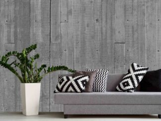 Concrete Look Wallpaper, as seen on the wall of this living room, is a photo mural of a wood texture concrete wall from About Murals.