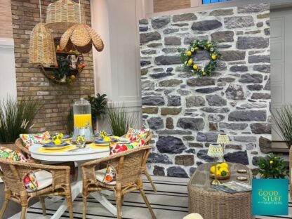 Country Stone Wallpaper, as seen on the TV show 'The Good Stuff with Mary Berg' as a backdrop to a patio vignette styled by Colin and Justin, from About Murals