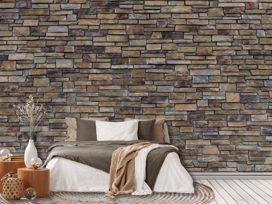 Stacked Stone Wallpaper, as seen on the wall of this bedroom, is a high res photo mural of real gray and brown stones that creates a rustic, textured look from About Murals.