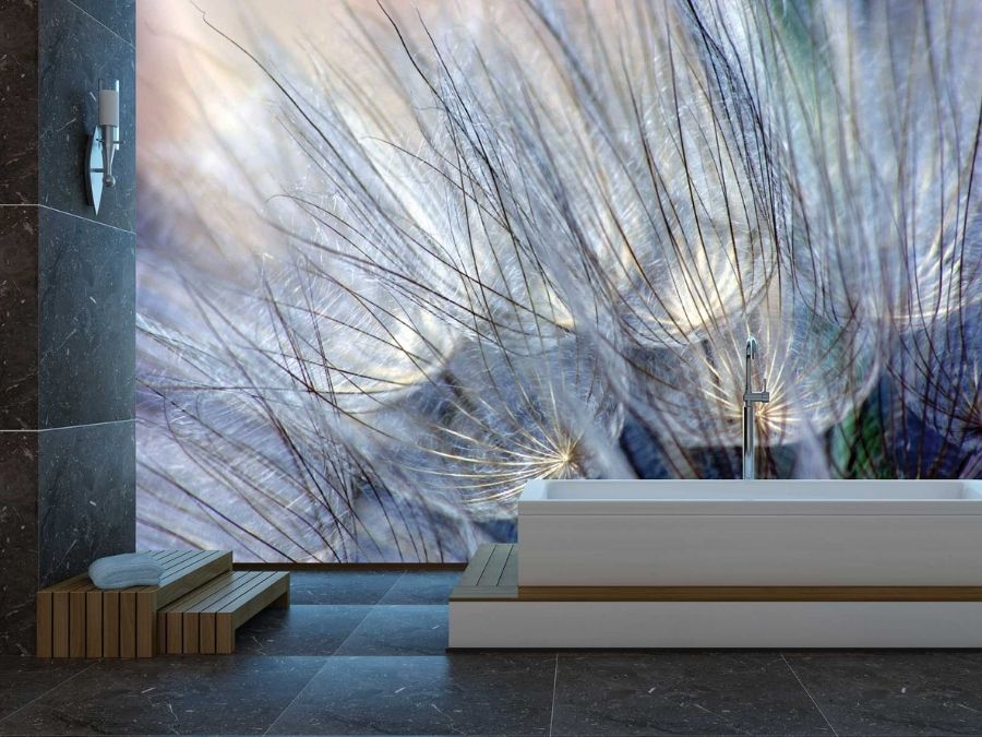 Purple Blue Dandelion Wallpaper, as seen on the wall of this bathroom, is a floral mural with giant dandelion seeds on a blue and green backdrop from About Murals.