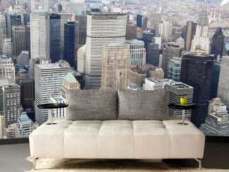 New York Wallpaper, as seen on the wall of this living room, is a photo mural of skyscrapers and buildings like the Chrysler Building in NYC from About Murals.