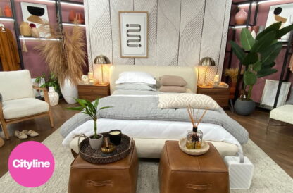 Scandi Leaf Wallpaper, as seen on the wall of Cityline's zen interior design created by Colin and Justin, is a wall mural of simple leaves raked into grey sand from About Murals.