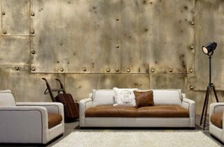 Sheet Metal Wallpaper, as seen on the wall of this living room, features riveted antique gold metal sheets from About Murals.