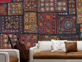 Tapestry Wallpaper, as seen on the wall of this living room, is an eclectic patchwork design with circle, diamond, star and square geometric shapes from About Murals.