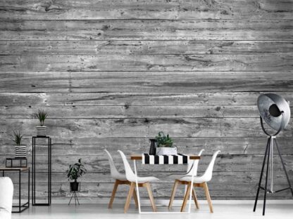 Grey Wood Wallpaper, as seen on the wall of this dining room, is a high resolution photo mural of grey horizontal wooden planks with texture from About Murals.