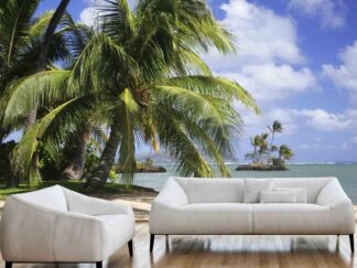 Tropical Island Wallpaper, as seen on the wall of this Hawaii themed living room, is a photo mural of palm trees overlooking the ocean and a white sand beach from About Murals.