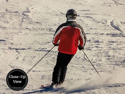 A close-up view of a skiier in a Whistler Ski Wallpaper from About Murals