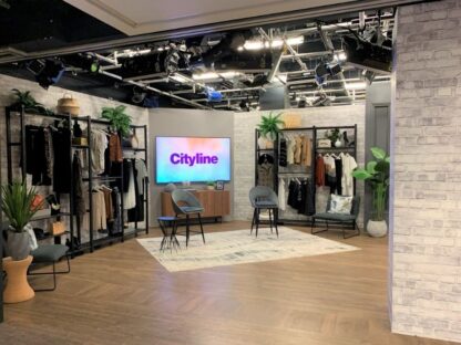 Old Brick Wall Mural Light Black and White, as seen in the Cityline Studio, is a photo mural of grey brick from About Murals.