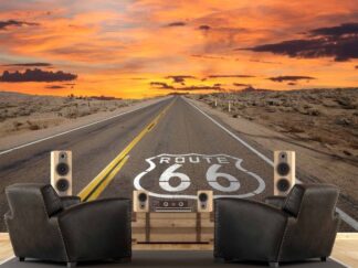 Route 66 Wallpaper, as seen on the wall of this man cave, is a photo mural of the Will Rogers Highway logo painted on the road under a sunset in the desert from About Murals.