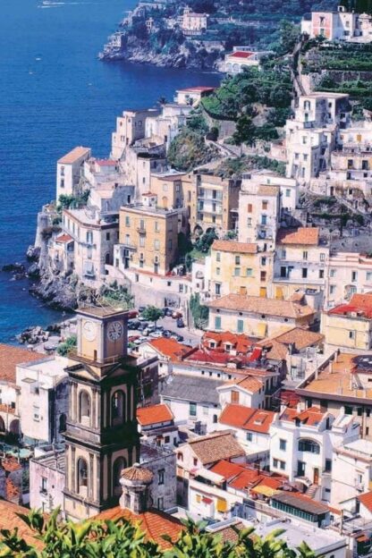 Amalfi Coast Wallpaper is a photo wall mural of a terracotta town on a hillside overlooking the ocean in Italy from About Murals