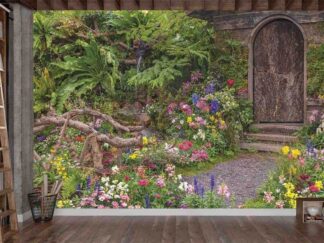 English Garden Wallpaper, as seen on the wall of this library, is a photo mural of flowers lining a path to a cottage country from About Murals.