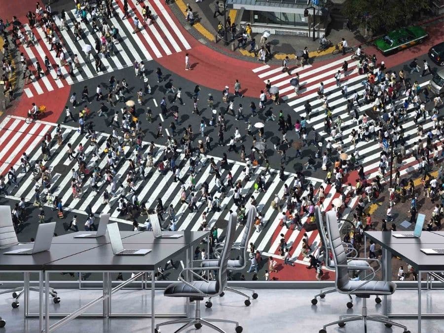 Shibuya Wallpaper, as seen on the wall of this office, is a photo mural of pedestrians using the scramble crossing in Kyoto, Japan from About Murals.