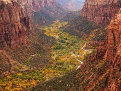 Zion Canyon Wallpaper is a photo wall mural of a small river winding through a deep gorge in Utah from About Murals.