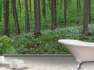 Trillium Wallpaper, as seen on the wall of this bathroom, is a high resolution photo wallpaper with delicate white flowers in a natural, green forest from About Murals